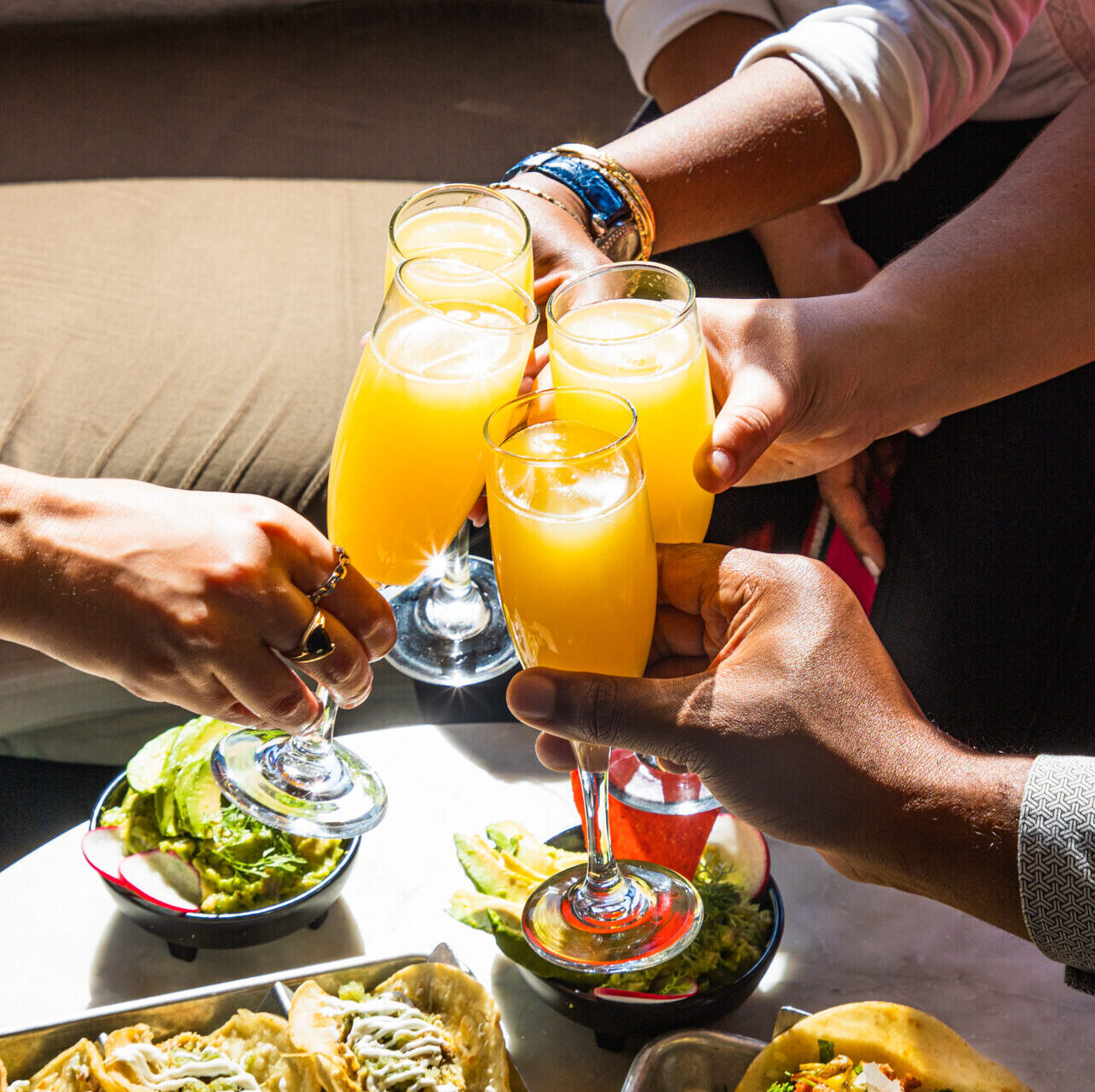 mimosas toast with tacos